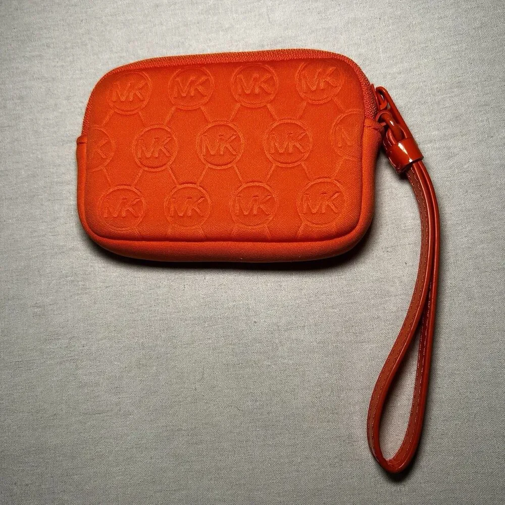 bright orange Michael Kors neoprene wristlet with a matching strap